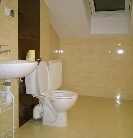 Δωμάτια σε οικογενειακή κατοικία Goscinne *